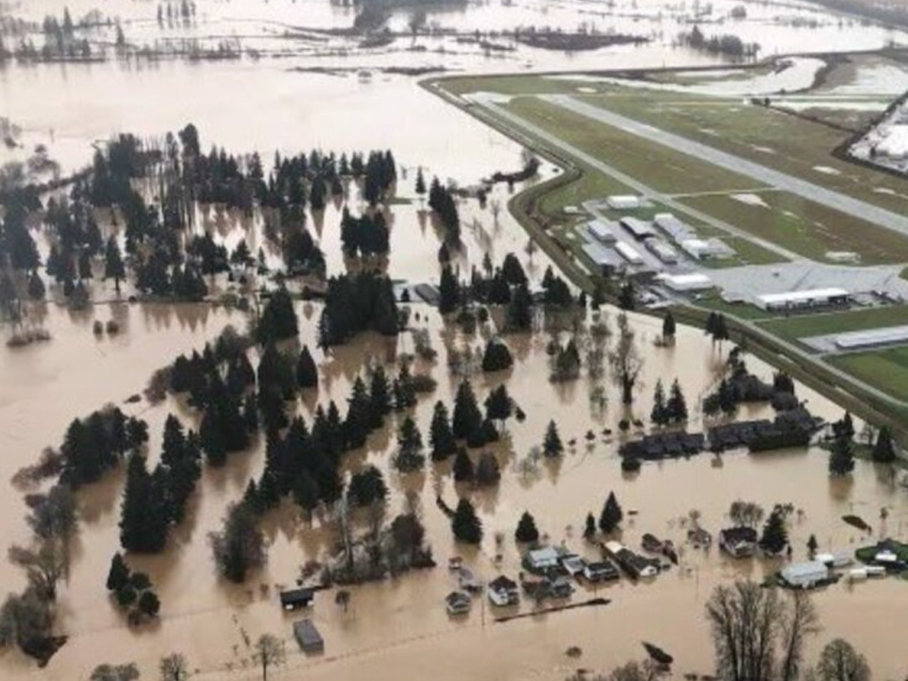 The Chehalis-Centralia Airport and surrounding businesses are seen protected from floodwater by the levee on Jan. 7, 2022